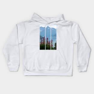 Wonderful landscapes in Norway. Vestland. Beautiful scenery of Romsdal Fjord from the Torvikeidet village. Nice flower composition in foreground. Snowed mountains Summer cloudy day (vertical) Kids Hoodie